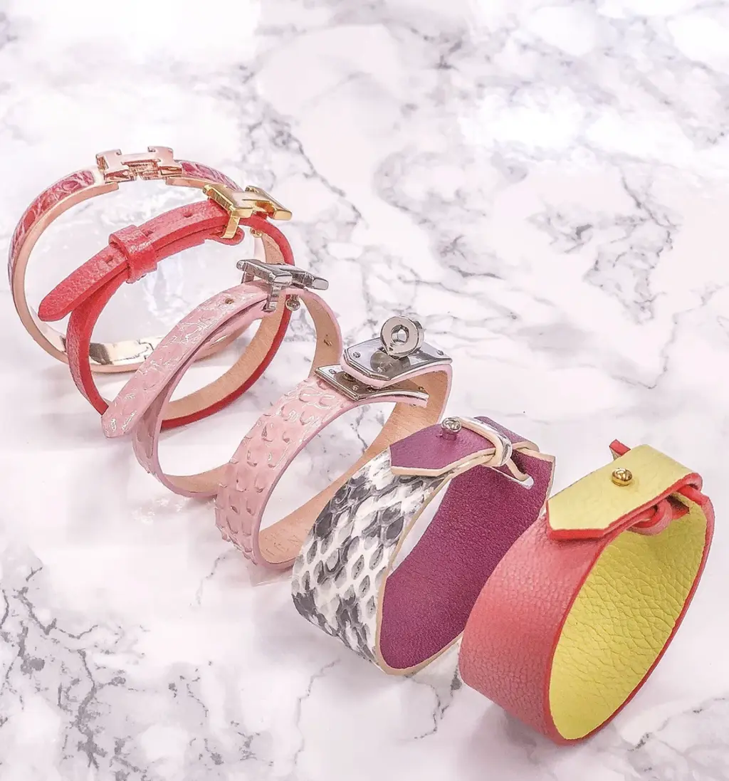 different bracelets on a marble table
