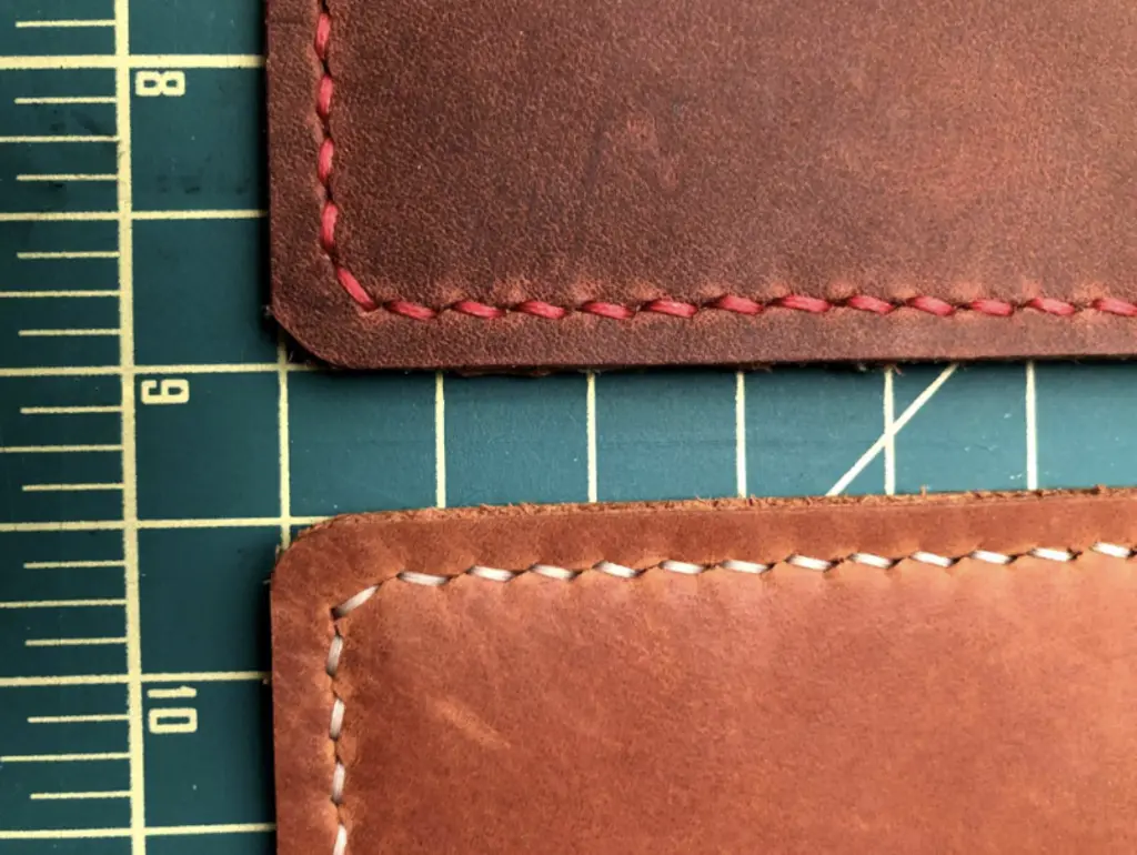 a close up of leather on a cutting board