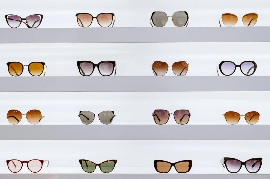 a stand of different sun glasses