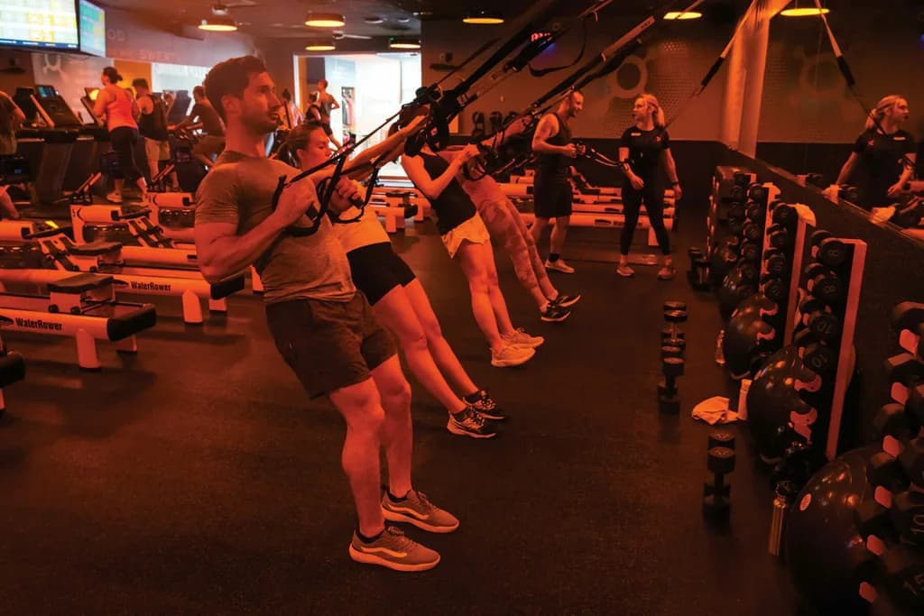 a close up of people using trx bands